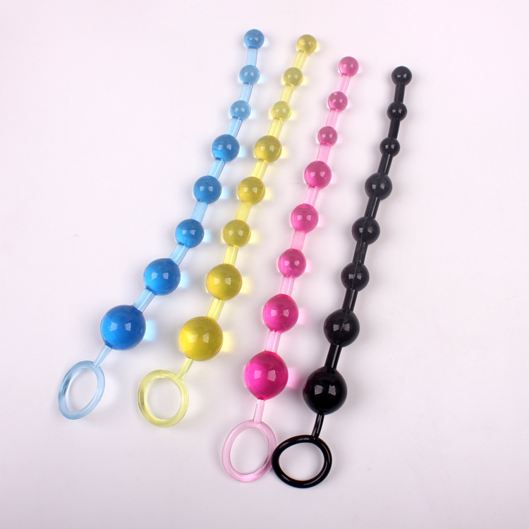 Crystal anal plug with rotating beads, suitable for both men and women. Provides G-spot stimulation, expansion, and massage.